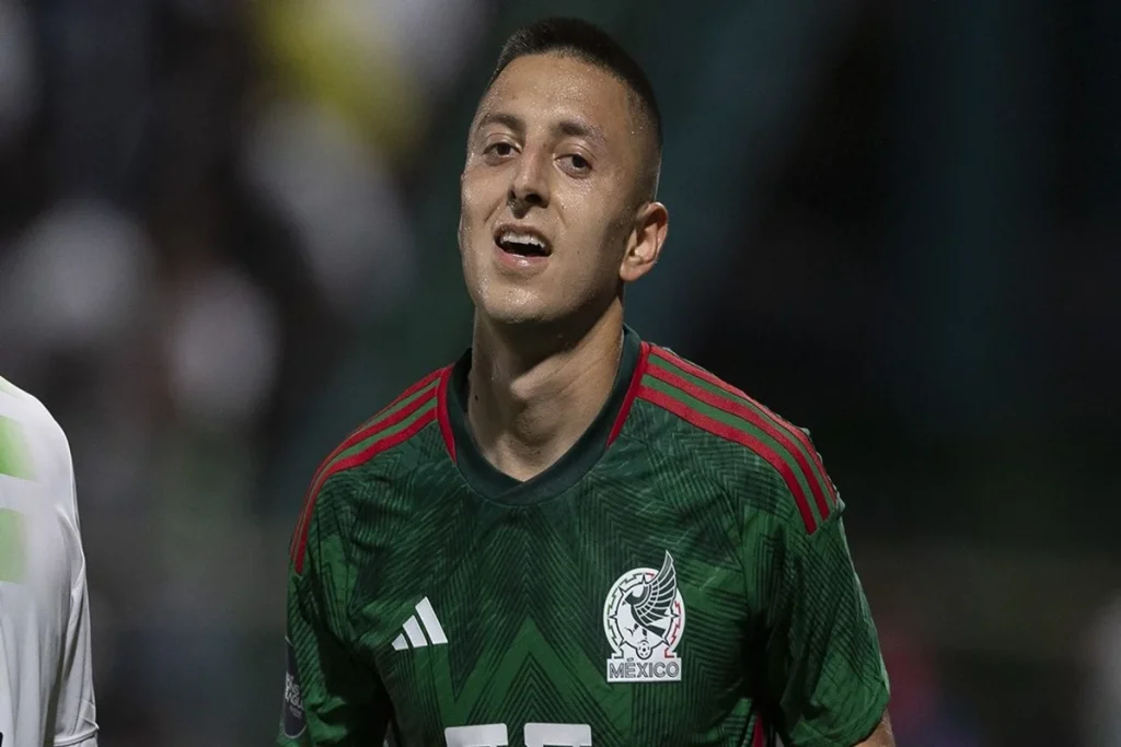 Brazilian midfielder Bruno Guimarães looking serious while wearing the bright yellow and green Brazil national team jersey.